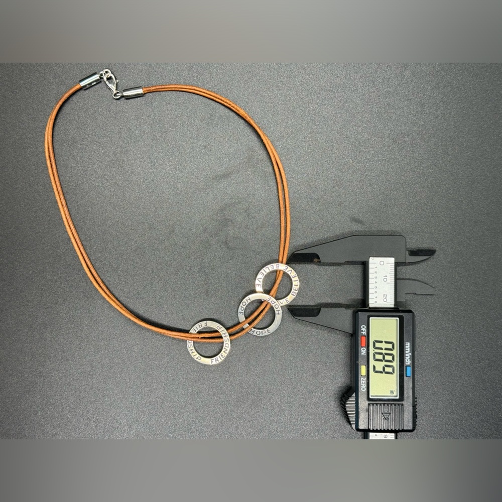 Silpada Designs. “Friendship”, “Hope”, and Believe” charms w/ 16” leather cord.